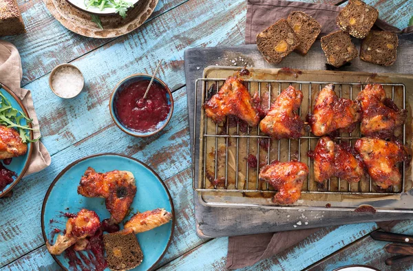 Chicken wings in cranberry sauce — Stock Photo, Image