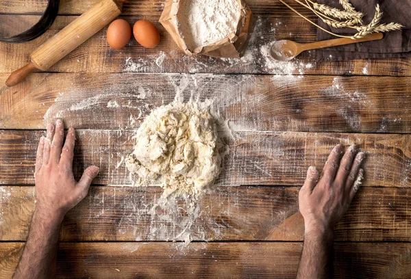 Man prepares the dough — Stock Photo, Image