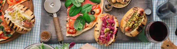 Dinner table with various food for company, top view — Stock Photo, Image