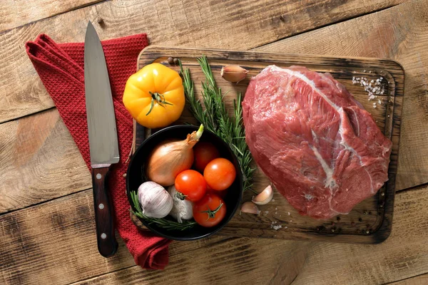 Fresh Meat On Chopping Board With Knife. Raw Meat. Two Peece Of Beef On  Wooden Table Stock Photo, Picture and Royalty Free Image. Image 60539396.