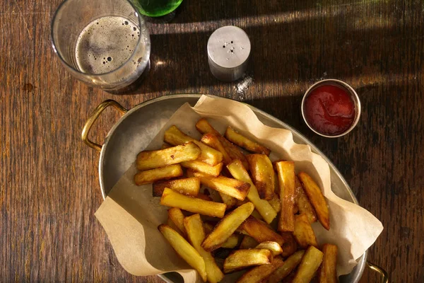 Pan of French fries with ketchup — Stock Photo, Image