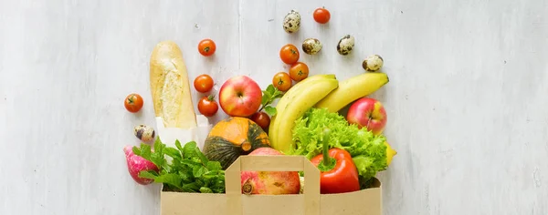 Top view paper bag of different fresh health food — Stock Photo, Image