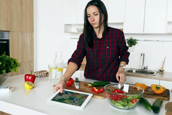 Woman cooking vegetable summer salad