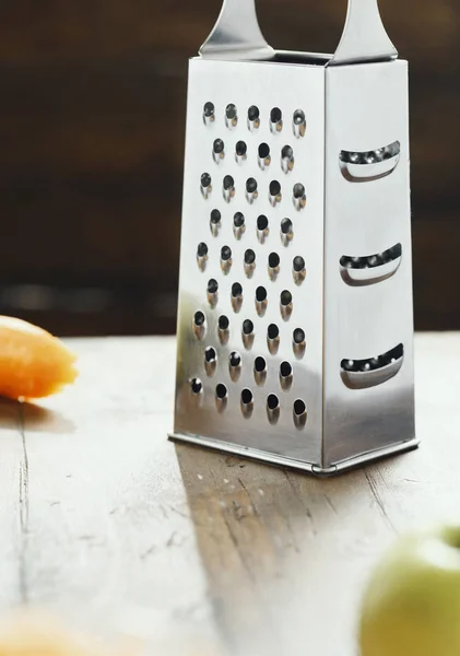 https://st3.depositphotos.com/4516737/19231/i/450/depositphotos_192315756-stock-photo-grater-ingredients-cooking-healthy-salad.jpg