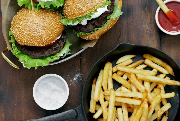 Top View Burgers French Fries Sauce Wooden Table — Stock Photo, Image