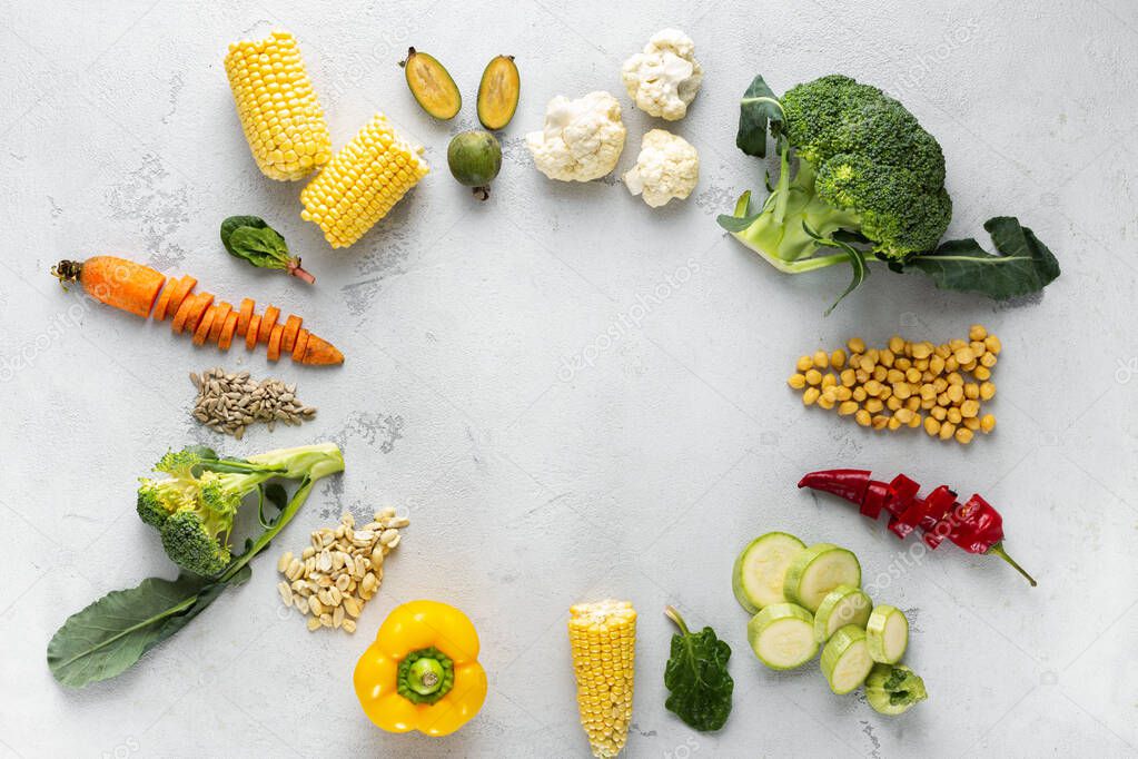 World vegan day. Frame of fresh vegetarian various ingredients for cooking vegan plate overhead view
