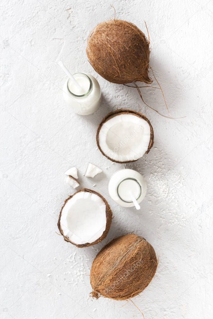 Coconut kefir in glass bottle on white background. Vegan non dairy healthy or fermented drink. Healthy eating concept Top view Top view