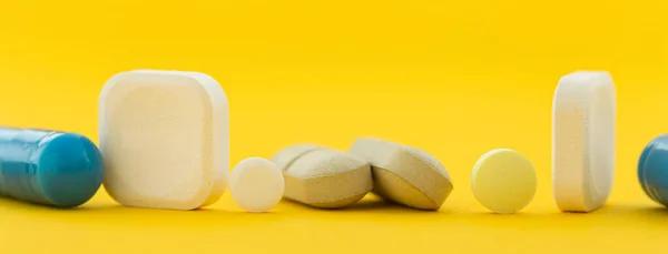 Different Pills Yellow Background Close — Stock Photo, Image