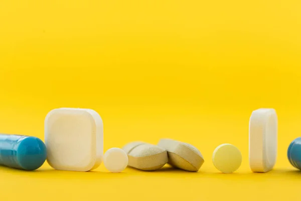 Assorted Pharmaceutical Medicine Pills Capsules Tablets Yellow Background Close — Stock Photo, Image