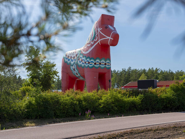 The world 's largest Dala horse statue in Avesta, Sweden (summer 2018
)