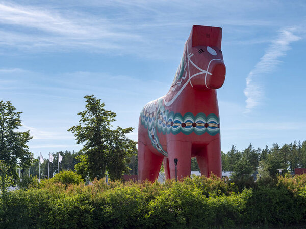 The world 's largest Dala horse statue in Avesta, Sweden (summer 2018
)
