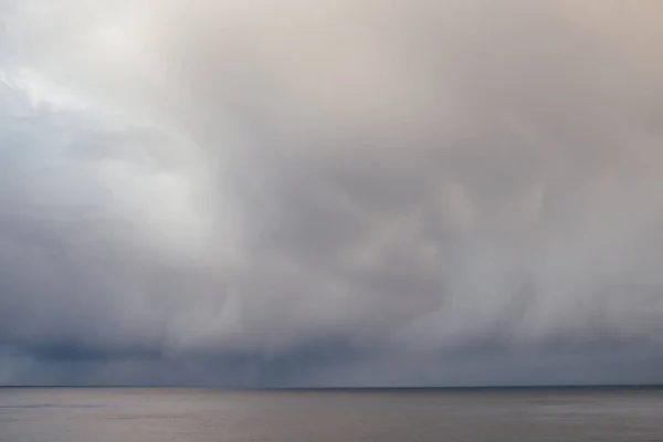 Stormy clouds over the sea — Stock Photo, Image