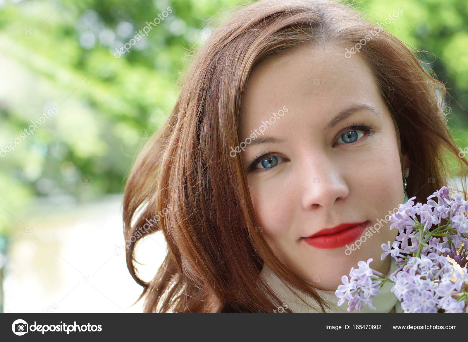 Beautiful Face Of A Young Red Haired Girl With White Skin Blue