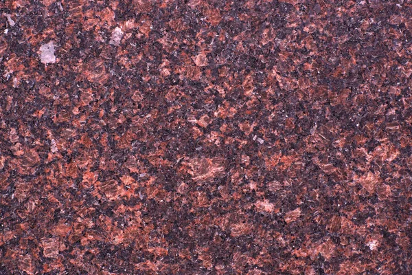 Naturstein roter Farbe, Granit balmoralrot. — Stockfoto