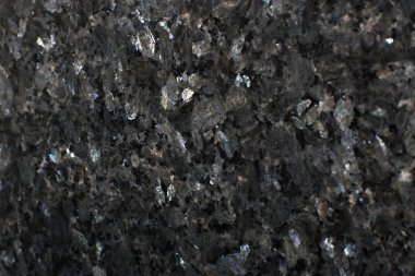 Arka plan siyah doğal granit Emerald Pearl yakınındaki