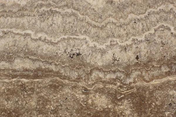 Glad gepolijst travertijn surface - soorten marmer Travertino Classico beige met marmeren textuur op steen — Stockfoto