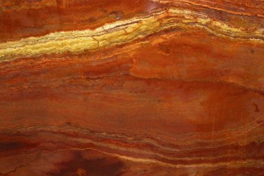 Travertin Rosso adındaki yemyeşil lavlardaki doğal taşın arka planı..