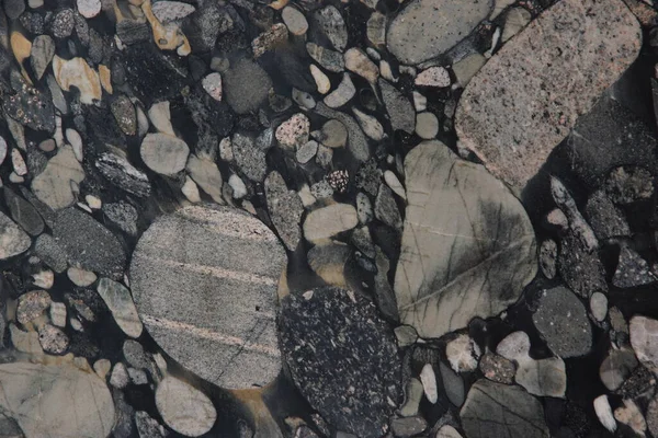 黒と灰色の色合いの小石を持つ美しい花崗岩 Nero Marinace — ストック写真