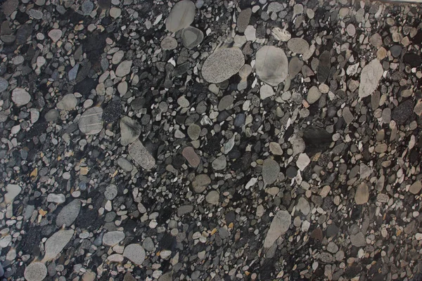 Granit Brésilien Naturel Avec Des Cailloux Dans Les Tons Noir Image En Vente