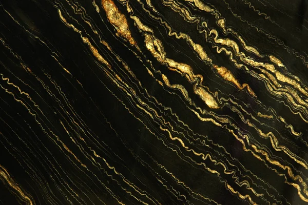 Quarzite Portoro Gold denen parlak sarı çizgileri olan doğal taştan siyah mermer..
