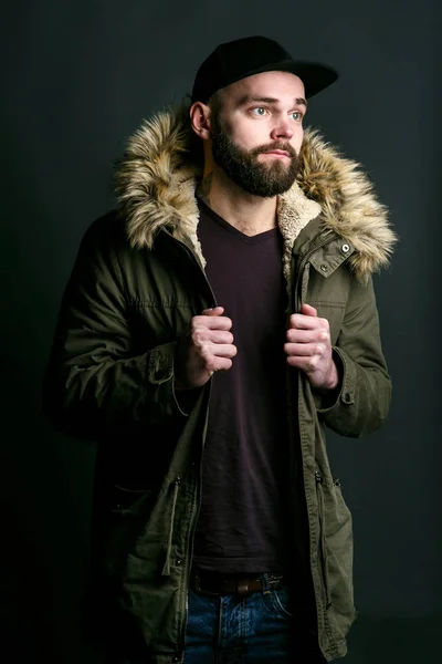Man in parka with fur hood
