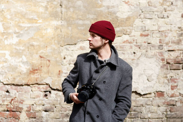 Handsome young man in red hat