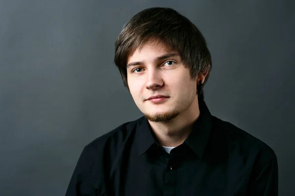 Brunette man in black shirt — Stock Photo, Image