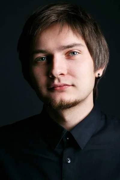 Brunette man in black shirt — Stock Photo, Image