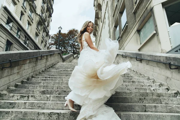 Blonde Bride Luxury Wedding Dress Whirls Footsteps Somewhere Paris — Stock Photo, Image