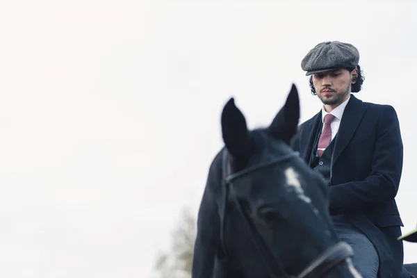 Caucasian Horserider Sitting His Dark Horse Wearing Stylish Suit Looking — Stock Photo, Image