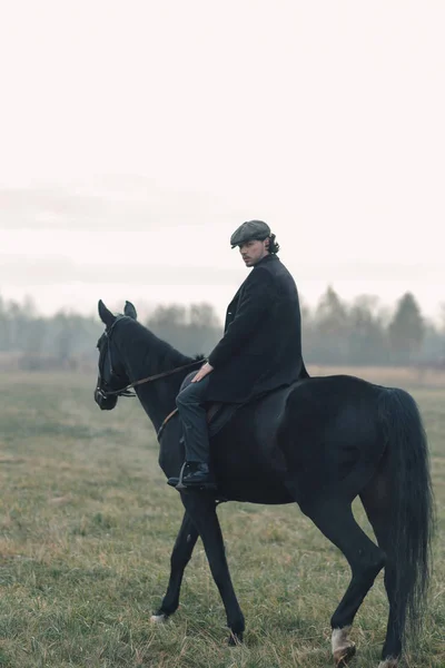 Back Photo Horserider Wearing Style Sitting His Wonderful Total Black — Stock Photo, Image