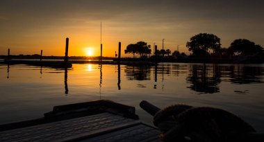 Sunset At Dock In Florida clipart