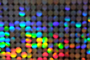 Renkli bulanıklıklar. Kıpkırmızı, mavi, yeşil metal.