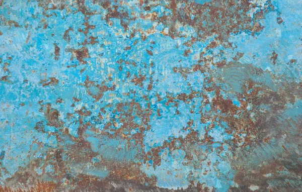 Sheet of old iron with traces of rust blue paint — Stock Photo, Image