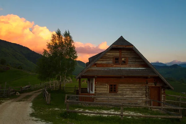 Carpathians mountain village with a old wooden houses Royalty Free Stock Images