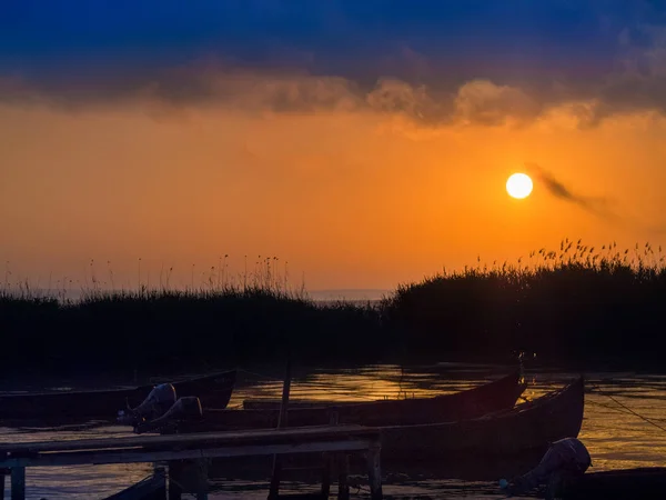 Amazing sunrise / sunset on lake. Sarichioi on Razelm lake. Romania