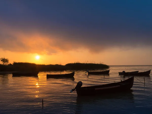 Amazing sunrise / sunset on lake. Sarichioi on Razelm lake. Romania