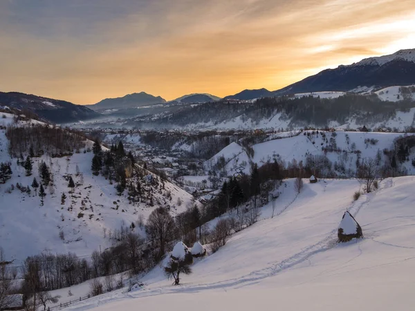 Countryside landscape with traditional Romanian village in the v Stock Picture