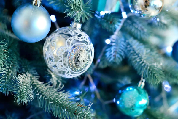 Decorated christmas tree with blue vintage balls and light. — Stock Photo, Image
