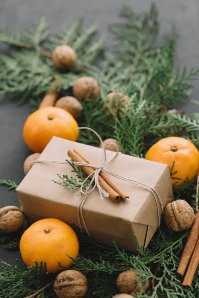 Christmas New Year Composition with Tangerines Boxes Pine cones Greens in Black Background Holiday Decoration Toned — Stock Photo, Image