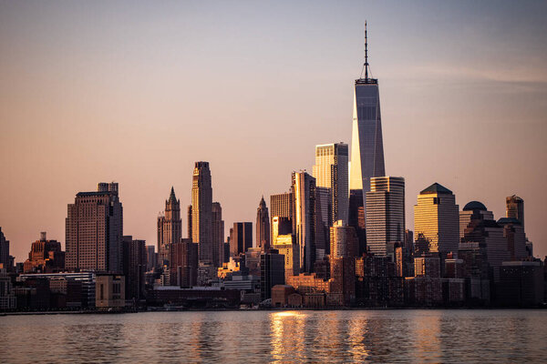 Early morning view of the grand architecture of New York City's financial district skyline