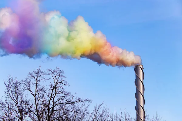 Metallic industrial chimney and a rainbow smoke — Stock Photo, Image