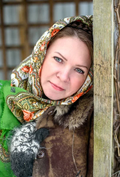 Beautiful Russian woman in a scarf
