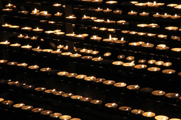 Candles burning  in the temple for dead and memories Stock Image