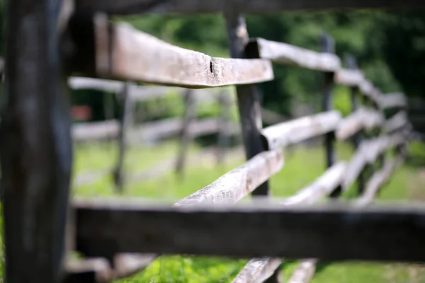 Old wooden rural corral fence in meadow — Stock Photo, Image