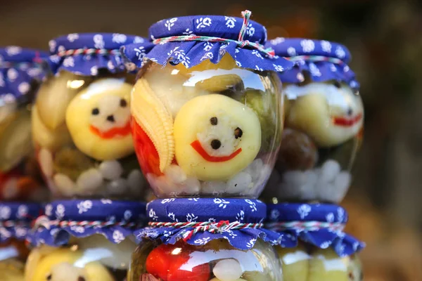 Homemade canned pickles in a jars at christmastime as a gift — Stock Photo, Image