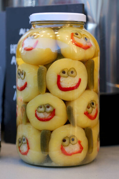 Funny jar of pickled vegetables in a hungarian christmas market 