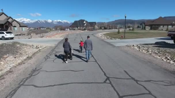 Aerial shot of family on walk — Stock Video