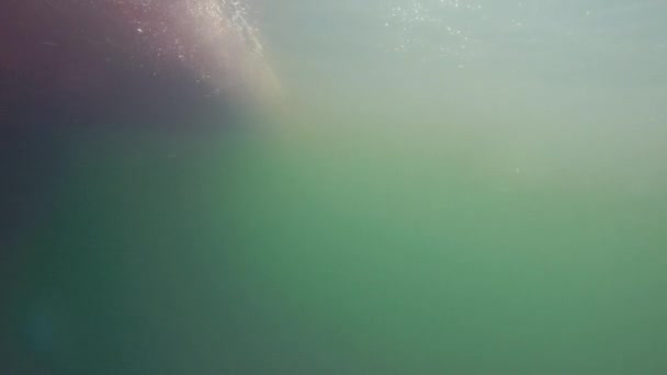 Bubbles passing by on the bottom of boat — Stock Video