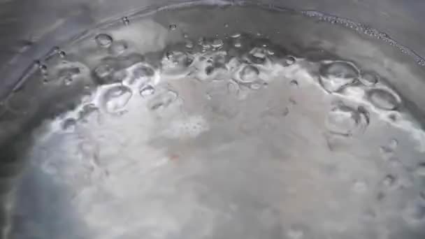 Boiling water in pot — Stock Video